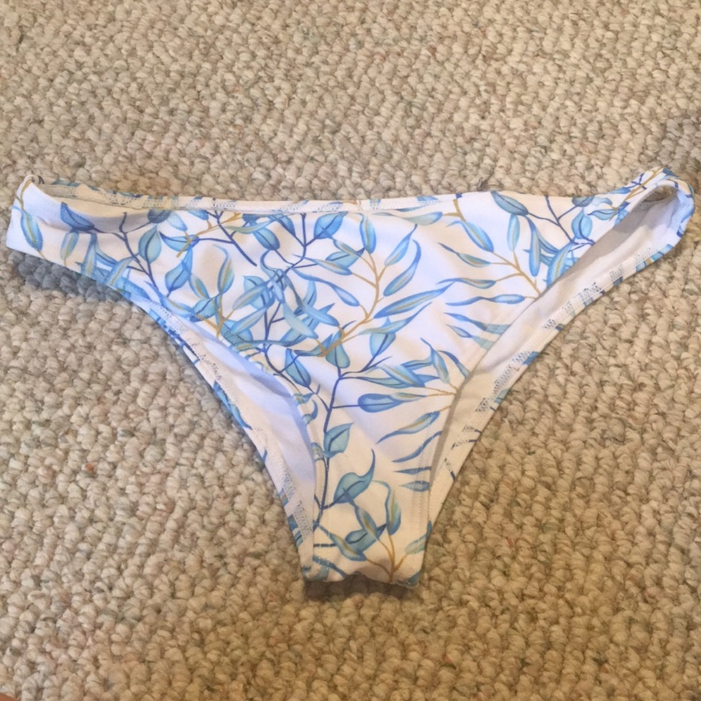 White and blue floral bathing suit bottoms